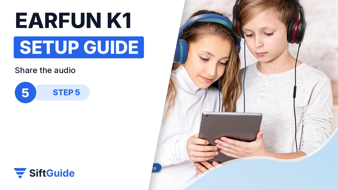 Two children sharing audio from one tablet with EarFun K1 headphones