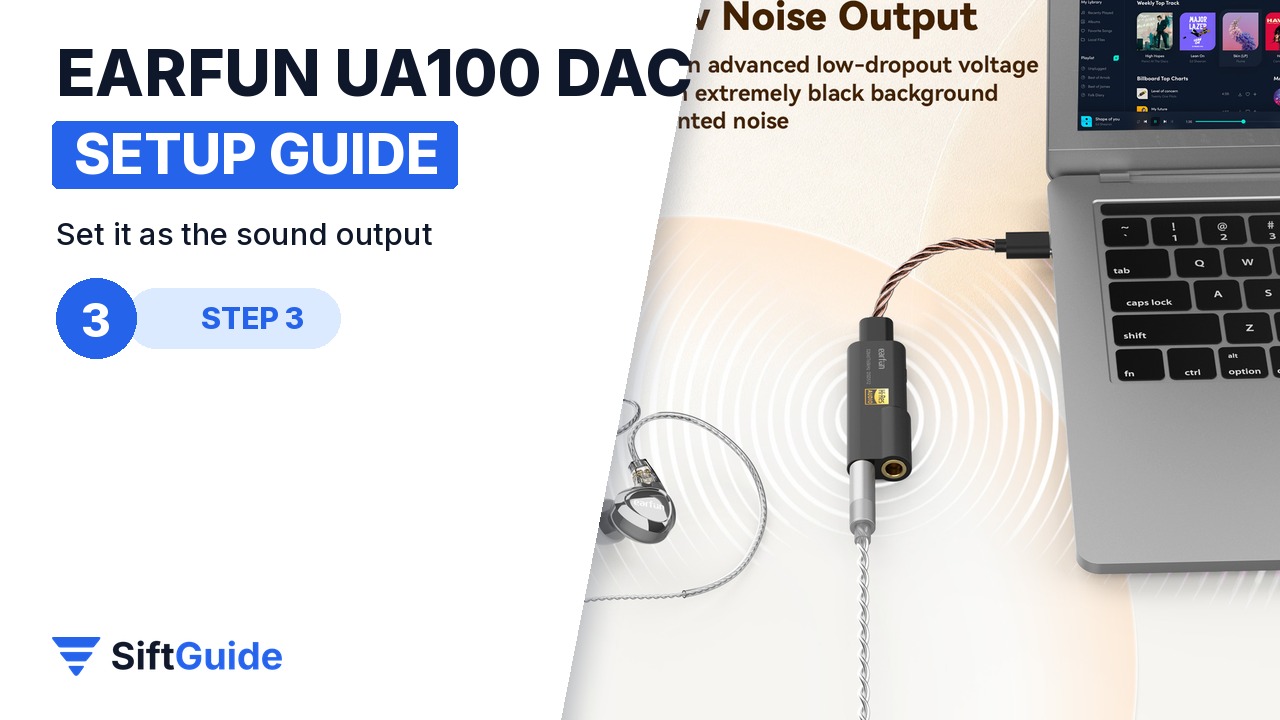 EarFun UA100 plugged into a laptop and in-ear headphones