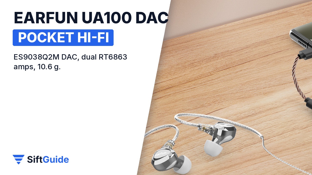 EarFun UA100 with a smartphone and wired earphones on a wooden desk
