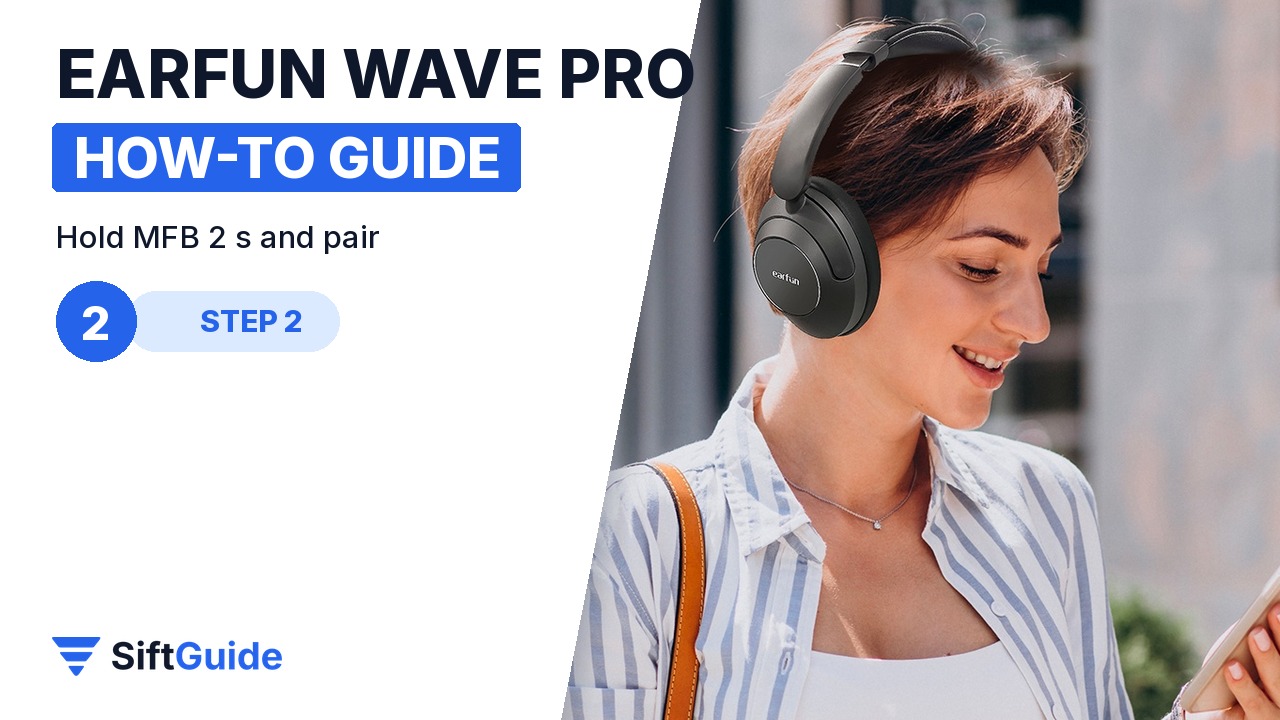 A woman wearing EarFun Wave Pro headphones