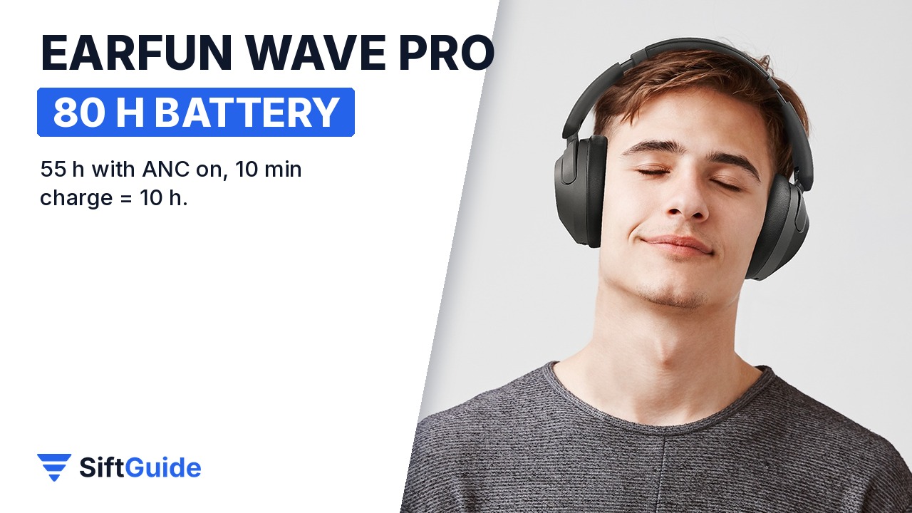 A man wearing EarFun Wave Pro headphones