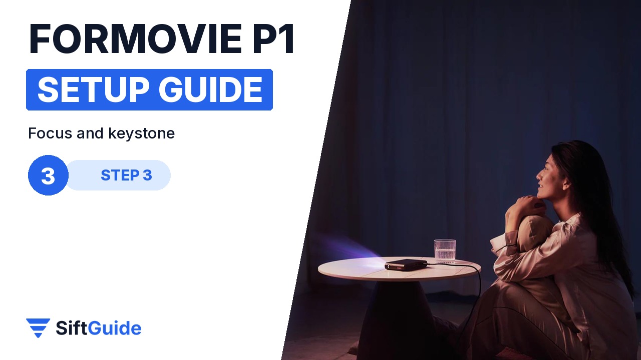 A woman watching a picture from the Formovie P1 in a dark room